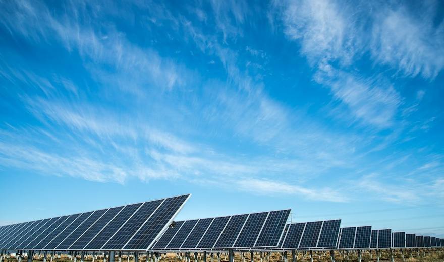 High-efficiency monocrystalline solar panels angled toward the sun